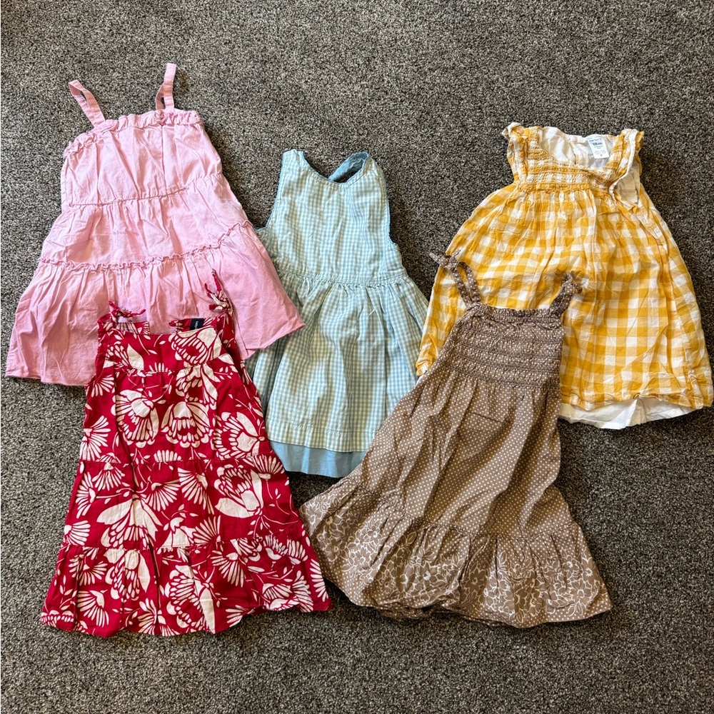 Assorted Girls' Dresses in Pink, Blue, Yellow, Red, and Brown